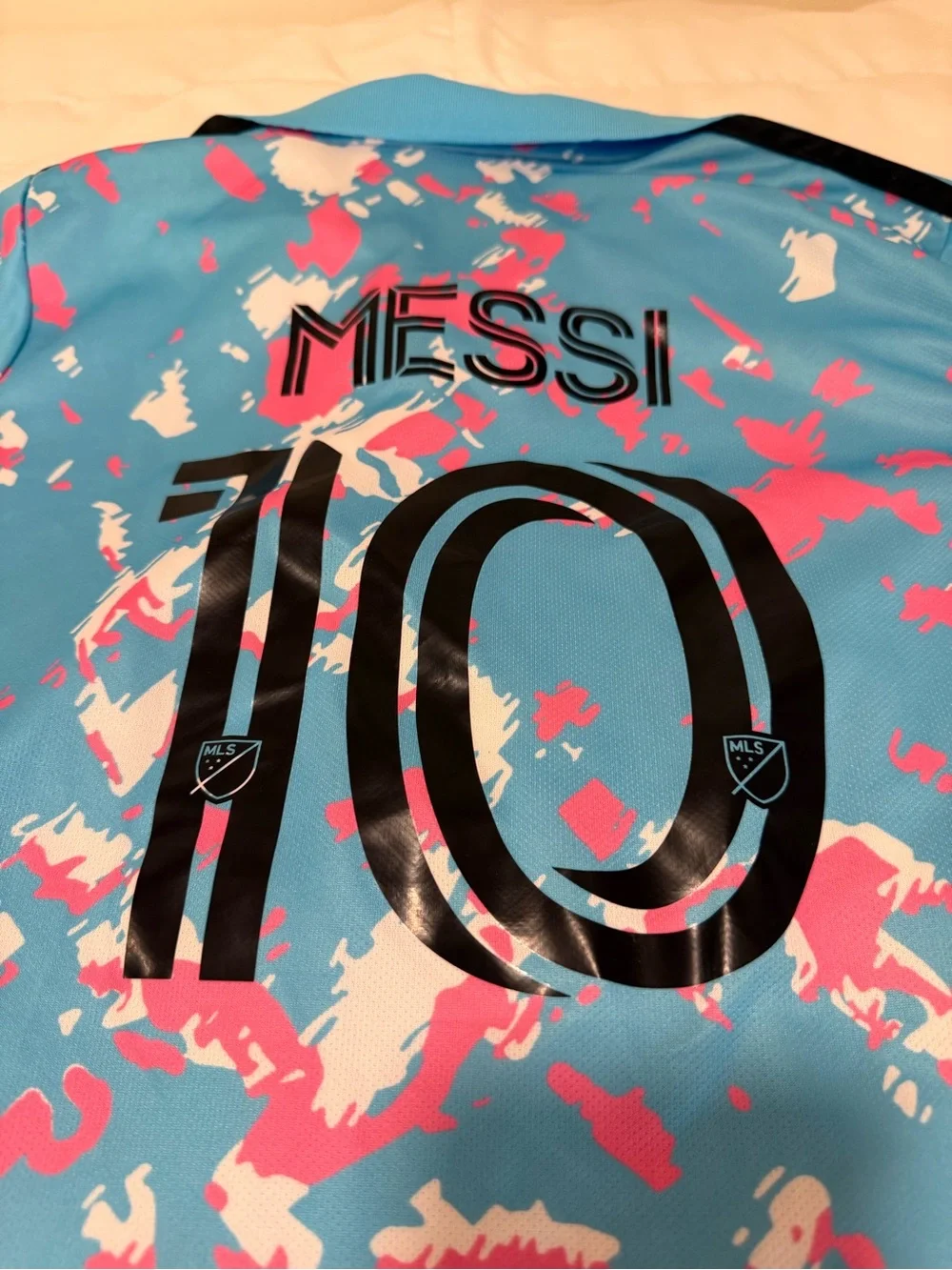 Kids' Aqua Polo with Pink & White Splash Print, team copy Messi size Large